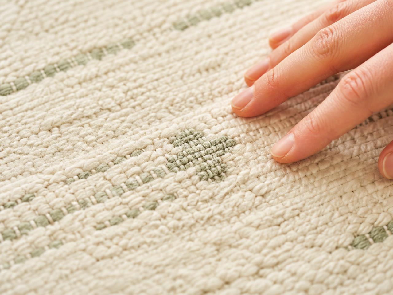Macro close-up of the woven organic cotton pile of a Willow rug